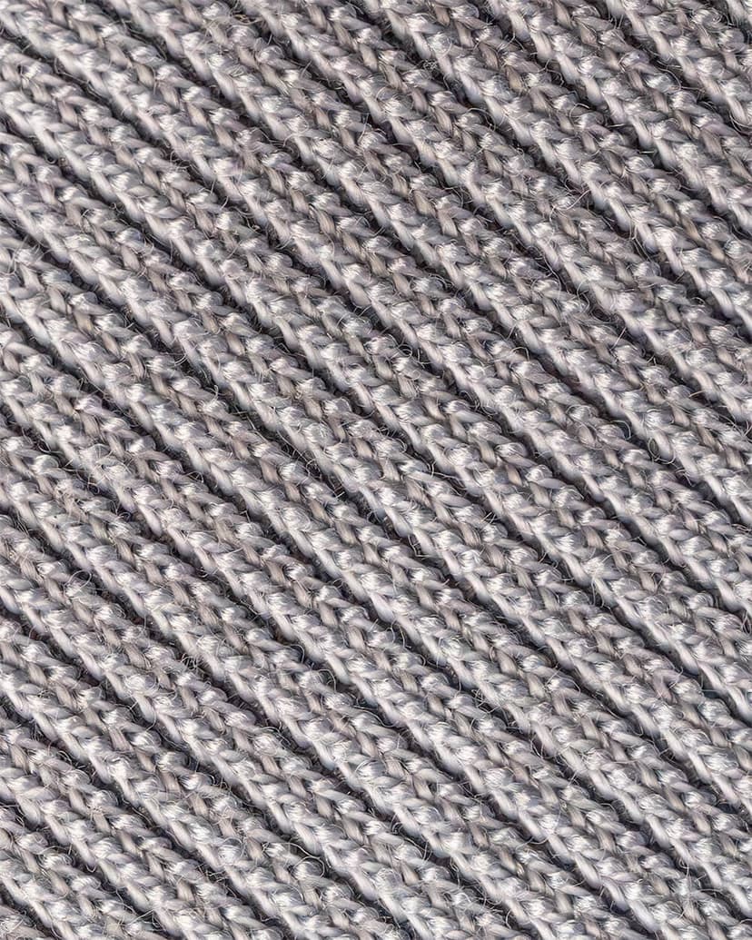 A close-up of a gray knitted fabric, perfect cozy hoodie material